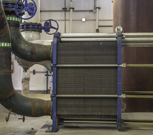 Commercial grade heat exchanger for a chill water cooling tower